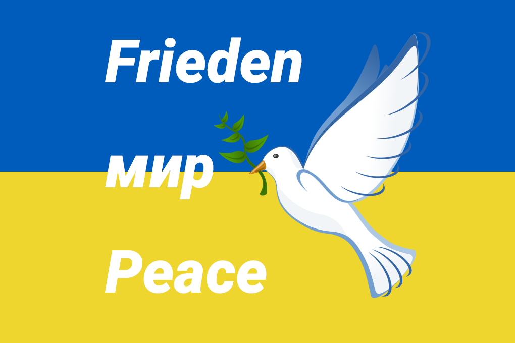 Ukranische Fahne mit Friedenstaube und Schriftzug Frieden in deutsch, russisch und englisch. Ein freies Europa ist wichtig für alle Warenströme in den Speditionen.